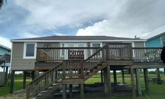 Matagorda Casa | Beach and river view cottage with deck and specatuclar views.