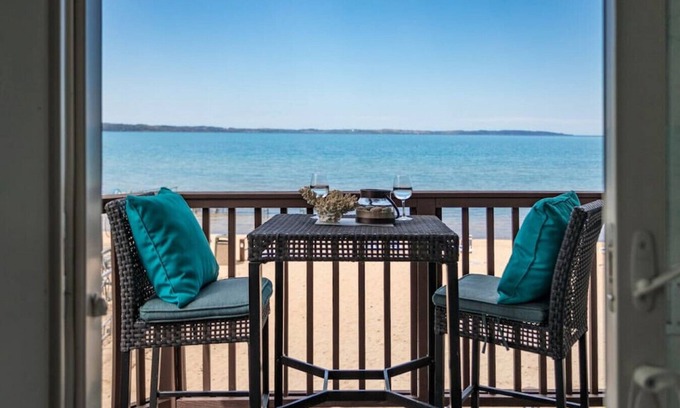 Traverse City Condominio | Beach Bliss 211 Balcony Water Views Beach Downtown