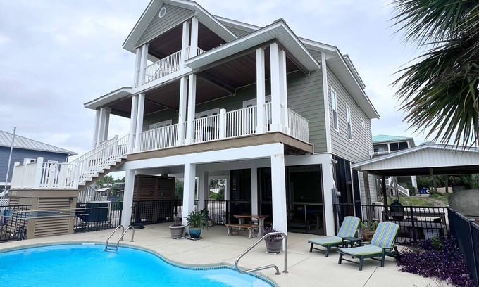 East End Casa | Beach front view. Golf Cart Friendly. Pool. Elevator.