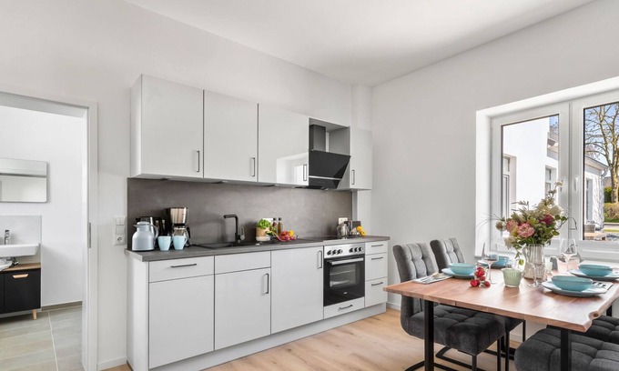 Gelting Apartamento | Beach shell - ground floor, terrace, garden furniture, barbecue, parking space, shower room, TV