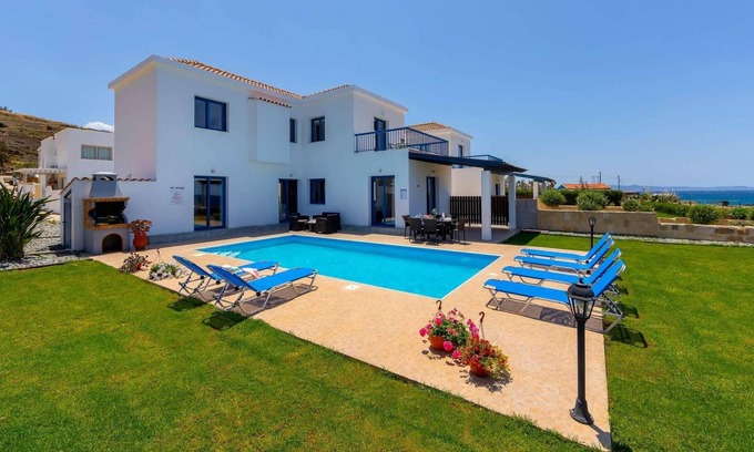 Pomos Villa | Beachfront 3 bed villa with sea views.