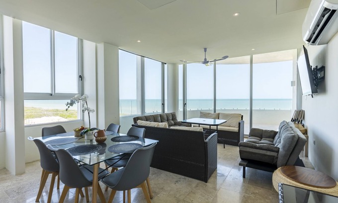 Miramar Apartamento | Beachfront apartment with private balcony, heated pool & stunning views