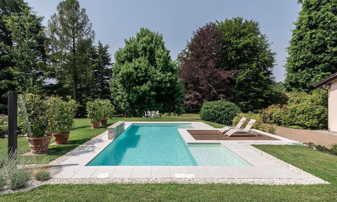 Beregazzo Con Figliaro Villa | Villa Marianna con piscina y canchas de golf y tenis cercanas.
