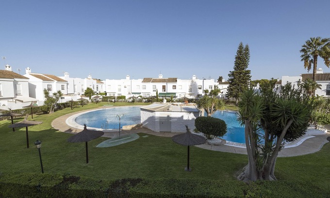 Los Gallos-Cerromolino Casa | BEAUTIFUL DUPLEX - Encantadora casa con piscina compartida y WiFi gratis.