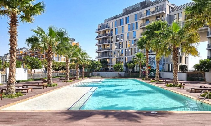 Dubai Production City Apartamento | Beautiful 1 Bedroom Flat With 5 Star Resort Style Amenities.