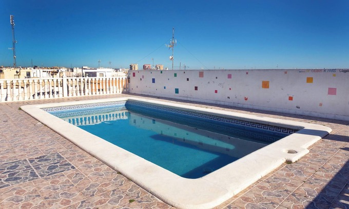 Torrevieja Apartamento | Precioso apartamento "Navgts5p33-1" cerca de la playa con piscina, aire acondicionado y terraza