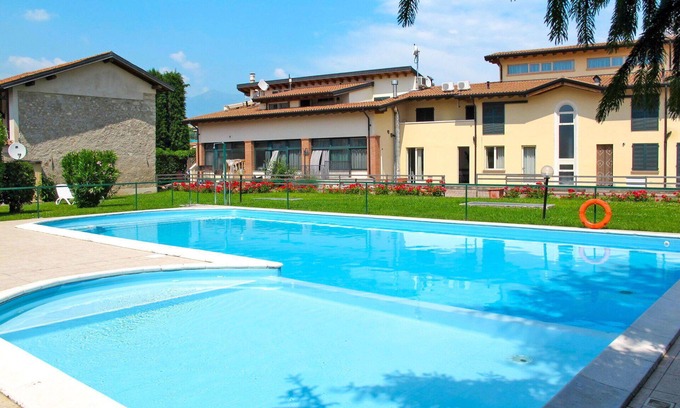 Cunettone-villa Apartamento | Apartamento con WIFI, A/C, piscina, TV, balcón, mascotas permitida, vista panorámica, aparcamiento