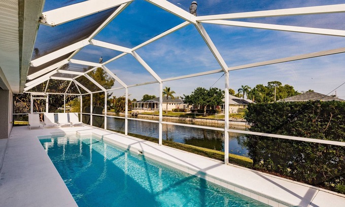 Trafalgar Casa | Beautiful Cape Coral Home, Outdoor Oasis with Heated Pool on a Freshwater Canal!