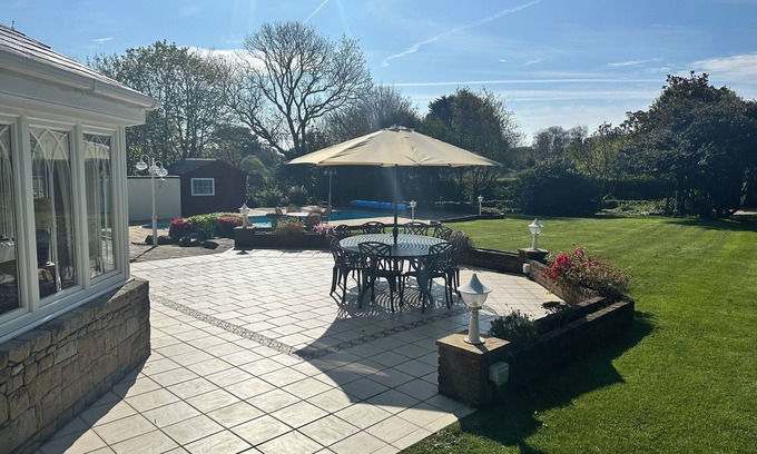 Village de Putron Casa | Beautiful five bedroomed family home in Guernsey with heated pool