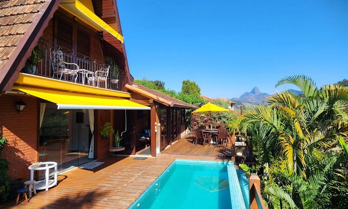 Itaipava Casa | Beautiful mountain house with 4 bedrooms, a/c, heated pool in Itaipava, Petrópolis