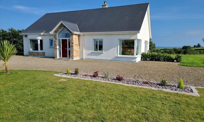 Kilmuckridge Casa | Hermoso bungalow nuevo, cerca de la playa de Tinnaberna