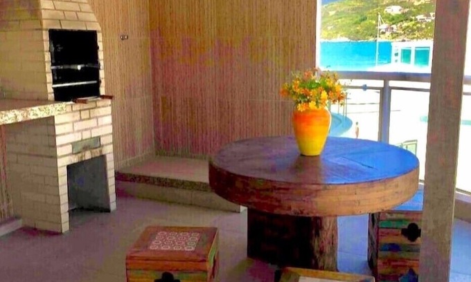 Centro Apartamento | Departamento frente a la playa dos Anjos terraza privativa y balcón con vistas al mar