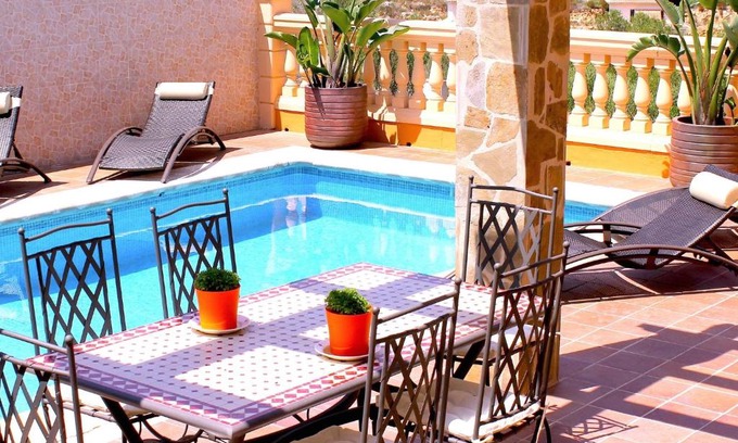 Cala Romantica Villa | Preciosa propiedad de 65 m² con terraza y un pequeño jardín