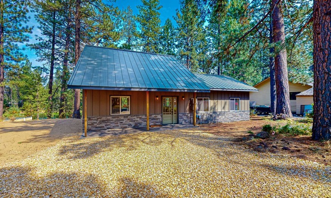 Three Rivers Casa | Beautiful riverfront home with private dock, fireplace, WiFi, and patio