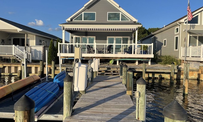 Montego Bay Casa | Beautiful, single home on a wide canal with boat slip and large pier.