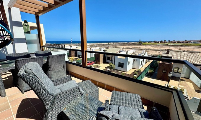 Caleta de Fuste Apartamento | Beautiful south facing penthouse apartment with amazing views in Caleta de Fuste