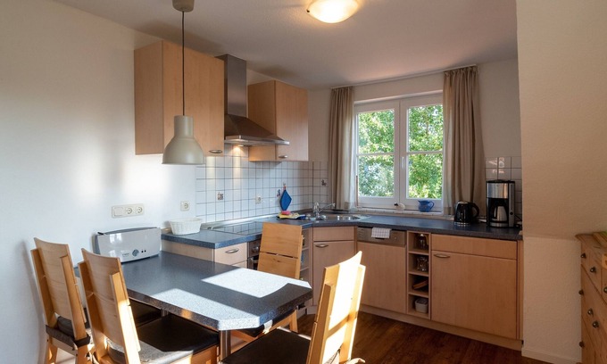 Spiekeroog Apartamento | Beautiful top floor vacation apartment in the east of the island with garden use