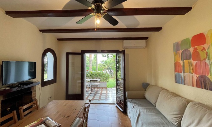 Pedreguer Apartamento | Bonito adosado, confortable y exterior, con vistas al jardín.