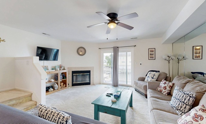 Ocean View Casa | Bethany Marina dog friendly bayfront townhouse w/pool, balcony, grill