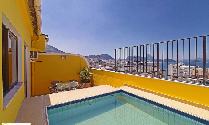 Copacabana Apartamento | Precioso ático duplex con terraza y piscina