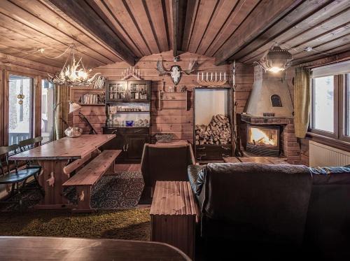 Auktsjaur Casa | Blockhaus am See
