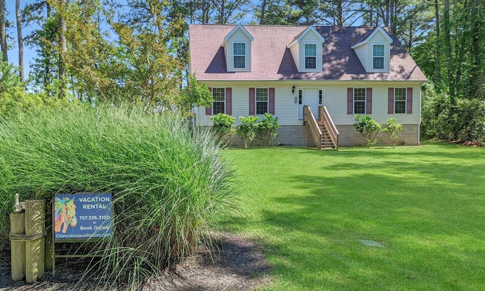 Piney Island Casa | Blue Heron, modern beach retreat with outdoor shower and screened porch