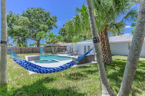 Palma Sola Casa | Blue Palm Home with Pool, Hot Tub, Nearby Beach, Outdoor Shower