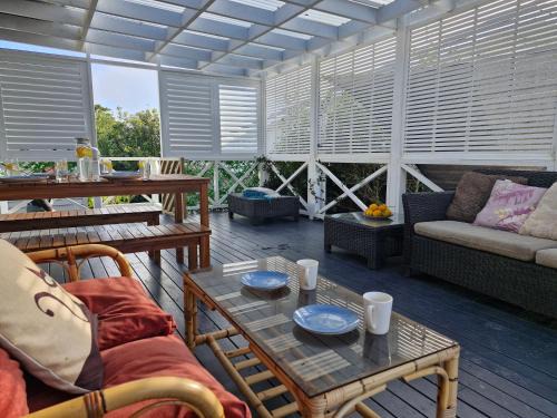 Snells Beach Casa | Bluebell Cottage on Matakana Coast Pet Friendly!