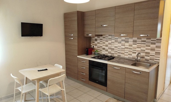 Calatabiano Apartamento | E81 Bilo Confort 2 camas en residencia con piscina y cancha de tenis