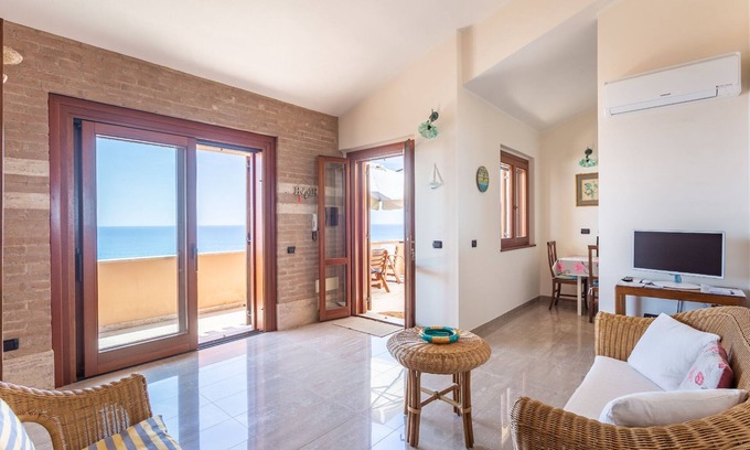 Funtana Meiga Apartamento | Apartamento Boutique VELA MEIGA - Impresionantes vistas al mar en el encantador Sinis