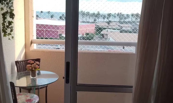 Barra dos Coqueiros Apartamento | Apartment right on the sand with sea view!