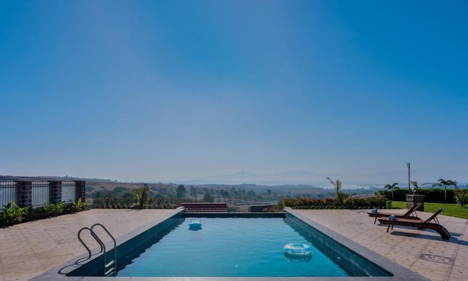 Igatpuri Villa | Breezy Whispers by StayVista - Private infinity pool, Stunning mountain views, Spacious swimming pool, Deck & Lawn