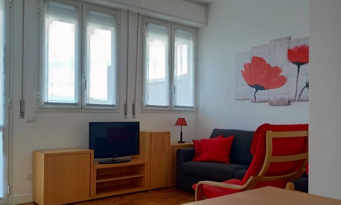 Cagnola Apartamento | Bright and modern one-bedroom apartment with terrace.