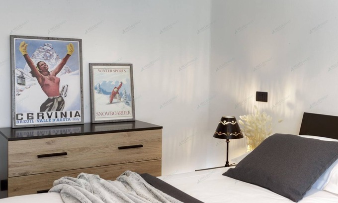 Paquier Apartamento | Bright apartment in the town center with ski storage and communal parking.