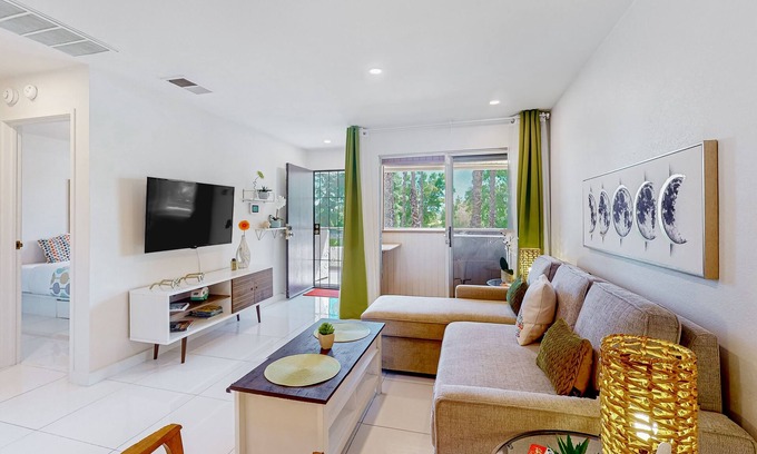 Racquet Club West Condominio | Bright & modern dog-friendly oasis with pool, tennis courts, balcony, & A/C