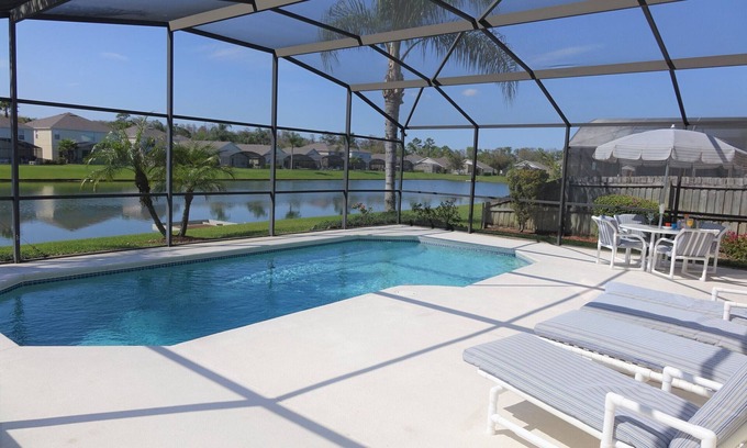 Lake Berkley Villa | BrightwaterVilla. Lake view, west facing extra large pool deck, lanai, hot tub