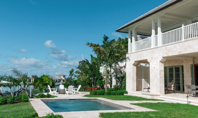 Dunmore Town Condominio | Briland Club - Coral Cottage, Luxury Waterfront Vacation Rental, Private Pool
