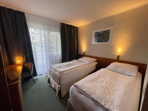 Schlangenluch Hotel | BusinessHotel Am Peetzsee Grünheide