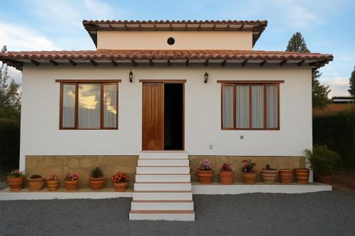 Villa de Leyva Casa | Cabaña familiar con 4 dormitorios y baños privados