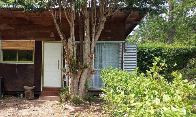 Villa Elisa Apartamento | Cabaña monoambiente con pileta y jardín arbolado