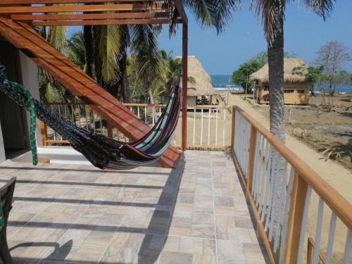 Monitos Casa | cabañas Brisas y Perla by AMAUNA