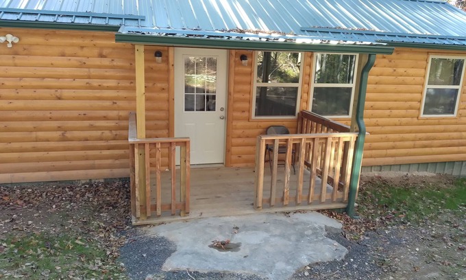 Marshall Cabina | Cabin with a tree house on a working buffalo farm near the Buffalo River.