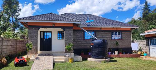 Uasin Gishu Casa | Camp Flo, Eldoret -Where Comfort Meets Tranquility in a 3-Bedroom Guest Stay -in own compound