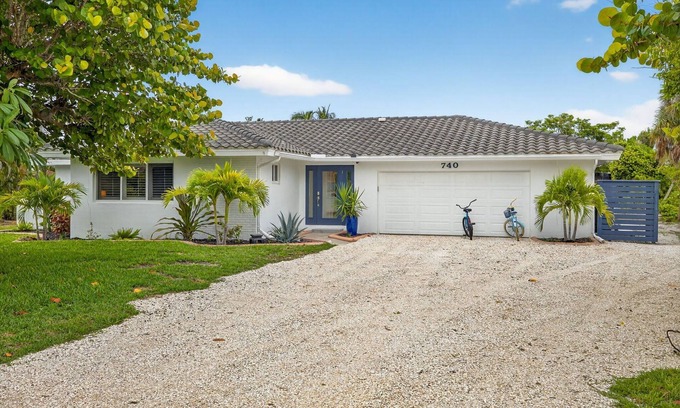 Sanibel Casa | Canal front ground level beauty steps to the beach