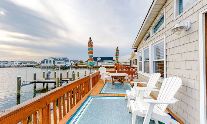 Montego Bay Casa | Canal front home with free WiFi, deck, private dock, shared pool & tennis