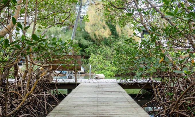 Bay Isle Casa | Canal-front home with a dock, GULF VIEWS, Shell Beach access.