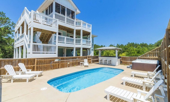 Carova Beach Casa | Canalfront 6BR home w/ pool & hot tub on the beautiful 4x4 beaches of Carova!