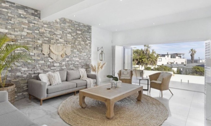 West Beach Casa | Cape Town Beach Home with Panoramic Ocean and Table Mountain Views. 11pax