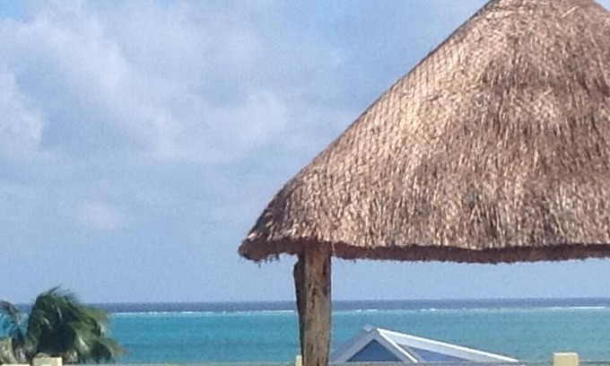 Caye Caulker Casa | Caribbean Sunrise Cottage