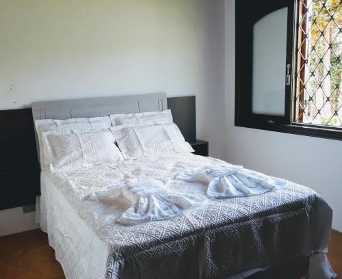Vila Britania Casa | Casa aconchegante para grupos e famílias